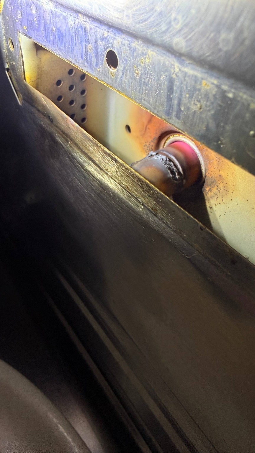 Localized burning and eroded metal inside a Thermador MCES microwave during inspection