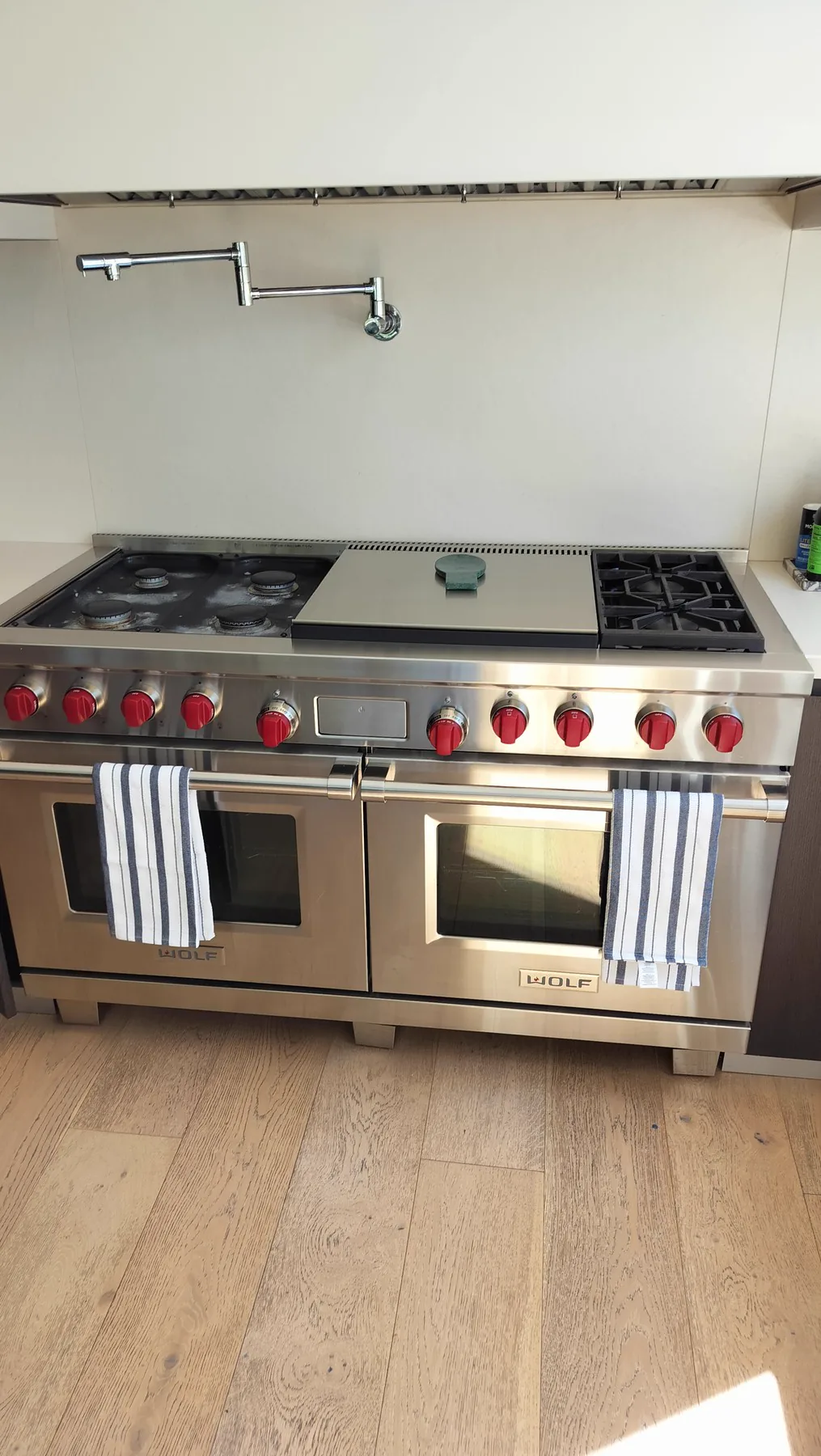 Wolf dual-fuel range in a residential kitchen during a KONGRA service visit.