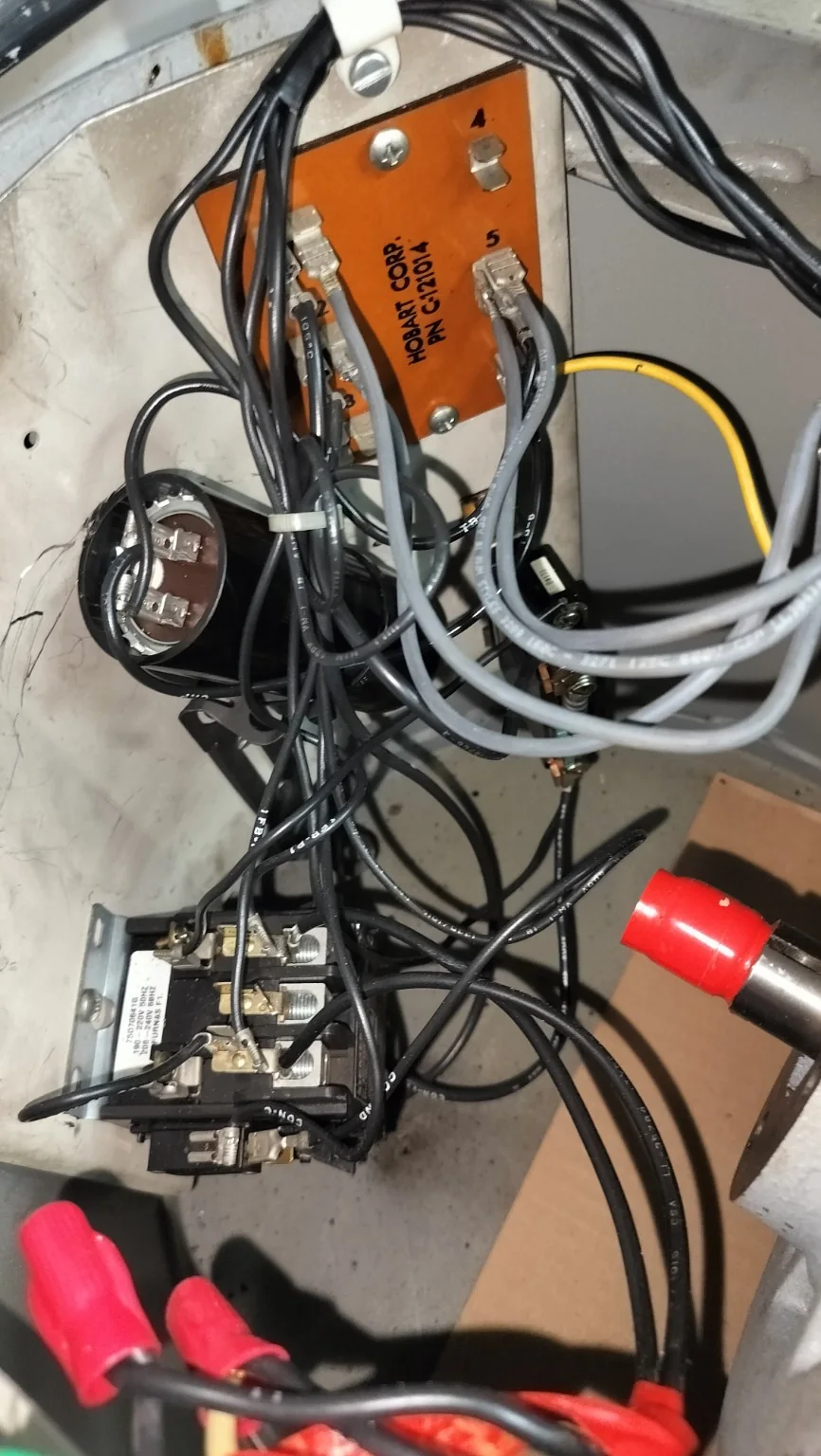 Open mixer electrical enclosure with wiring and control components visible