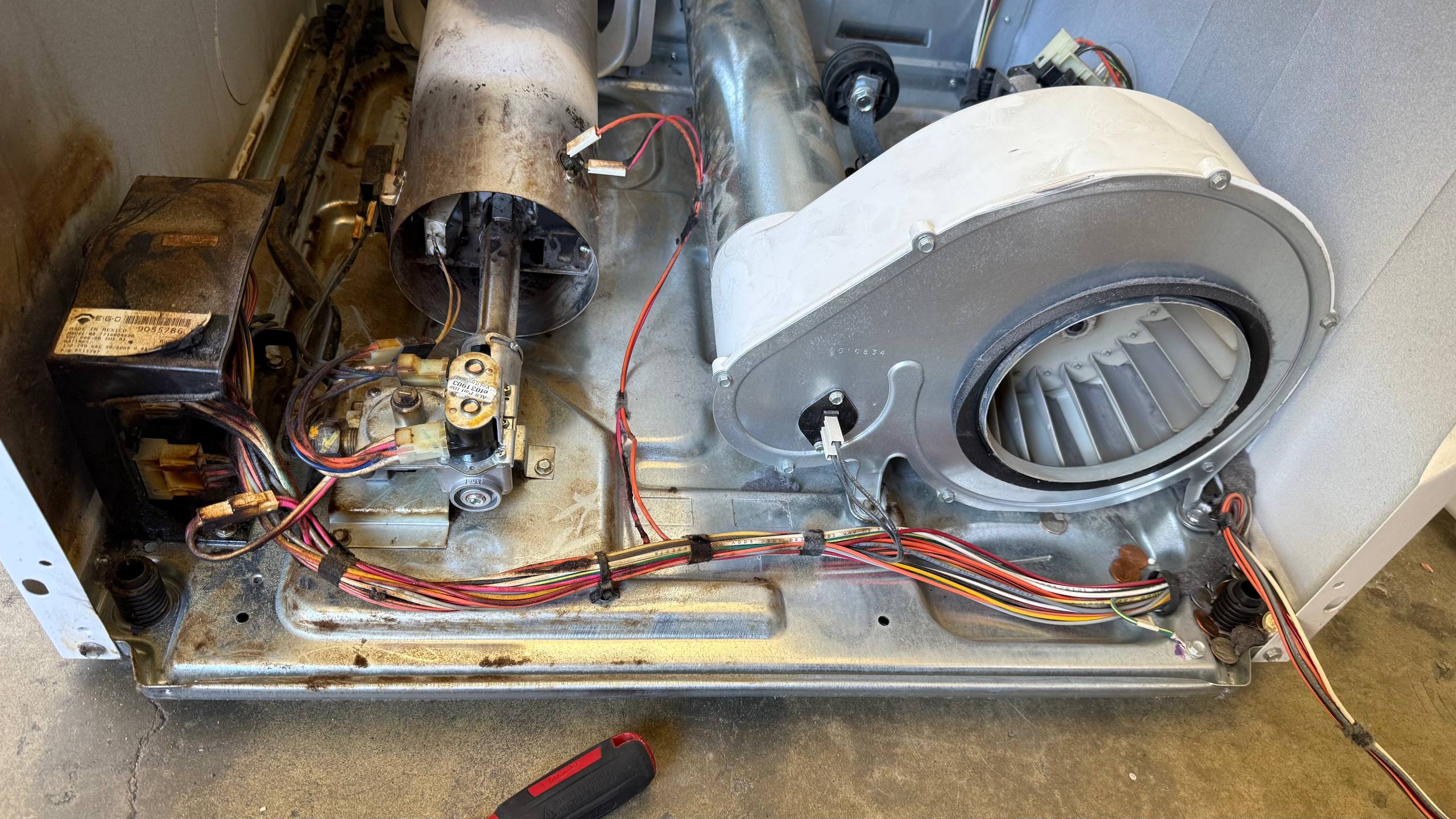 Second inspection view of the Speed Queen dryer burner and blower assembly in San Jose.