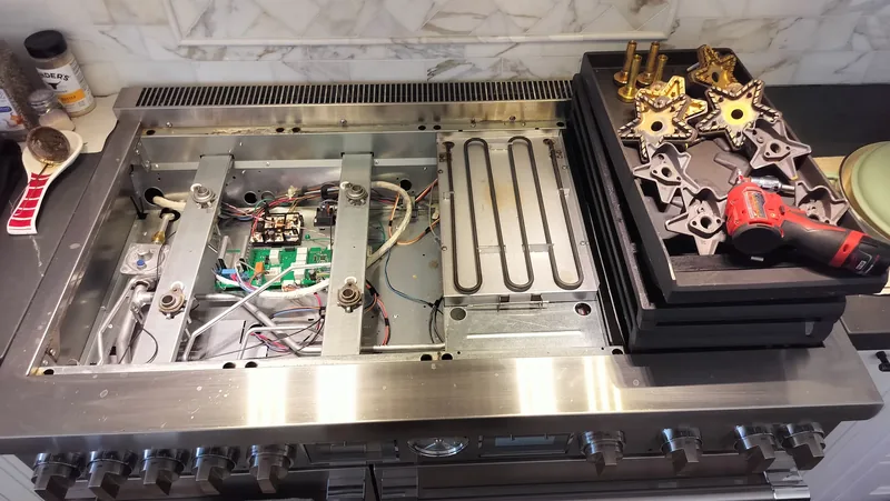 Open Thermador PRD48WDSGU Pro Grand range during control-system diagnosis.